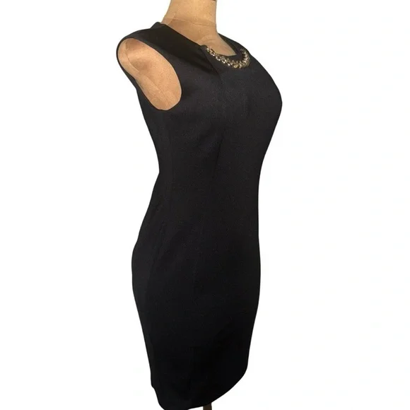 CALVIN KLEIN
Pre-loved Black Dress with Chain Accent💕
Size: 8 - Picture 3 of 10